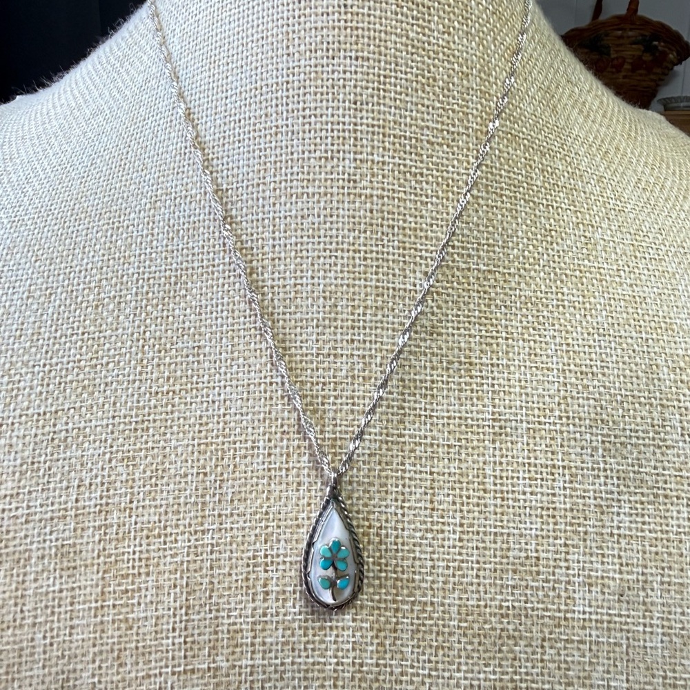 Vintage CL turquoise flower on mother of pearl, sterling silver necklace